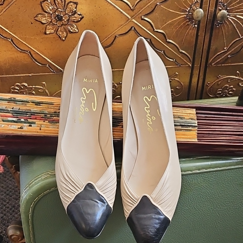 Elegant Beige and Black Heels by
